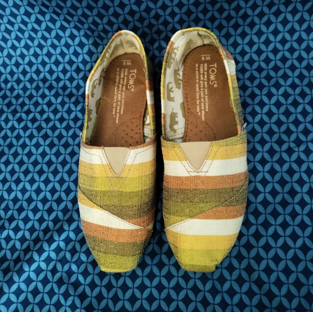 Toms - Ladies green, tan, brown & cream striped slip on walking shoes. Size 8W